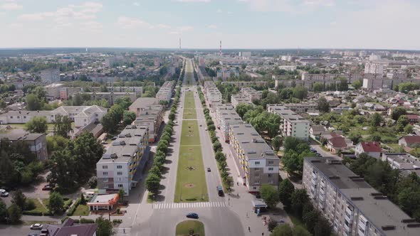 Central Wide Avenue Road with Plants in a Soviet City Aerial View