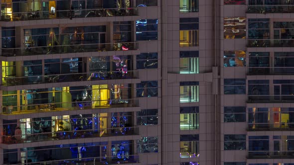 Night View of Exterior Apartment Colorful Building Timelapse with Windows