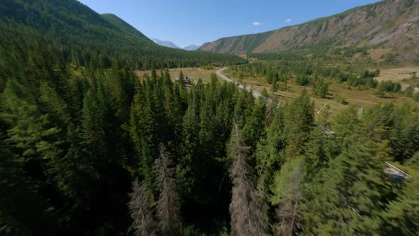 Aerial View Flight Over Camp Touristic Wooden House Mountain Sunny Glare Valley Natural Scenery