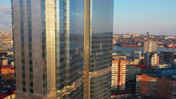 Drone View of a Modern Skyscraper Located in the Center of Vladivostok