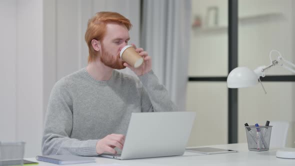 Redhead Man Having Toothache While Drinking Coffee