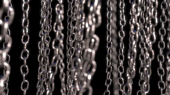 Vertical Chains On Black Background