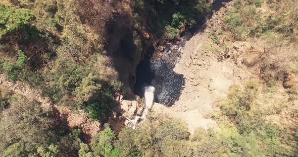 Drone footage birdseye point of view of big waterfall