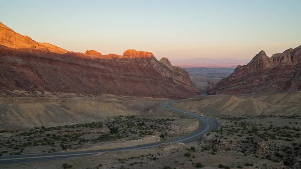 Sunset time lapse viewing traffic on I-70 through the San Rafael Swell