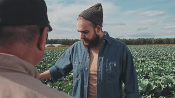 Farm Workers Discussing Plans