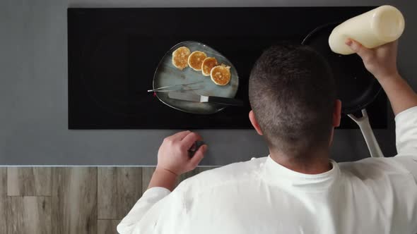 Top View of Chef Cooking in Modern Kitchen