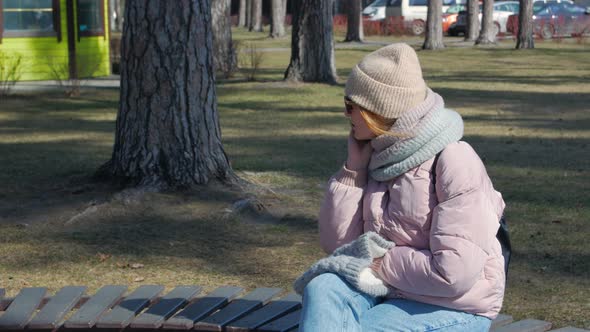 Woman Calling On Phone In The Park