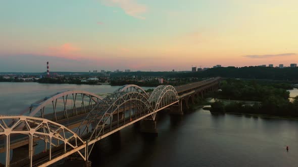 View From the Drone Flying Over the River Bridge