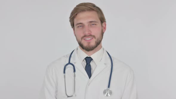 Young Doctor Talking on Online Video Call on White Background