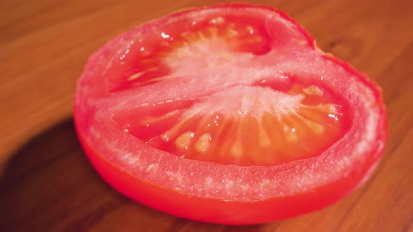 Cut Tomato on Wooden Table