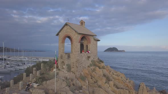 Alassio chapel aerial view and Gallinara island