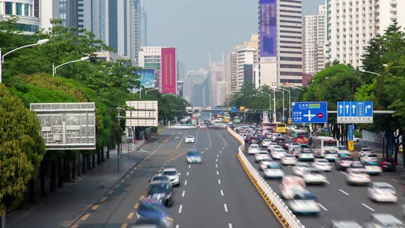 Timelapse Heavy Traffic on Shenzhen Highway with Road Signs