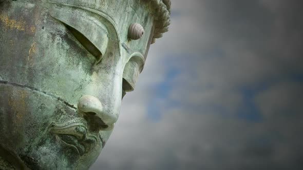 Buddha with Clouds in Blue Sky Moving