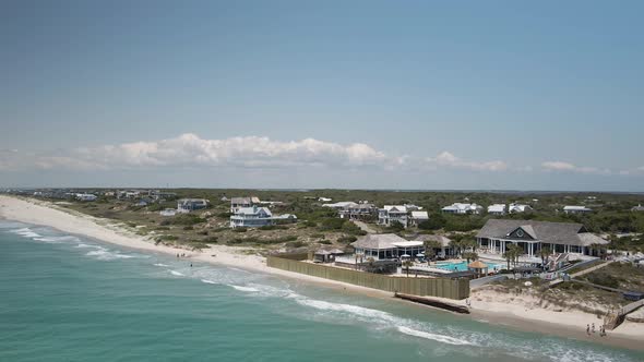 Aerial tracking left Bald Head Island beachfront