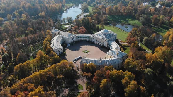 White Building of Pavlovsk Palace in Park Near River