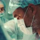 Surgeon Performs the Surgical Operation Together with a Team of Doctors - VideoHive Item for Sale