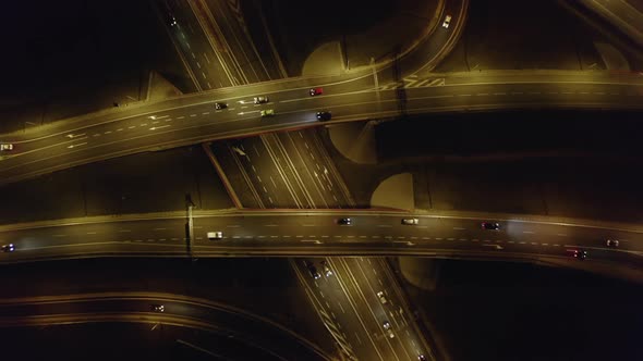 Drone Shot From Top View on a Night Freeway with Bridges and Viaducts