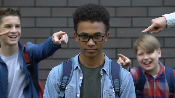 African-American Looking to Cam, Group of Caucasian Schoolmates Mocking Him
