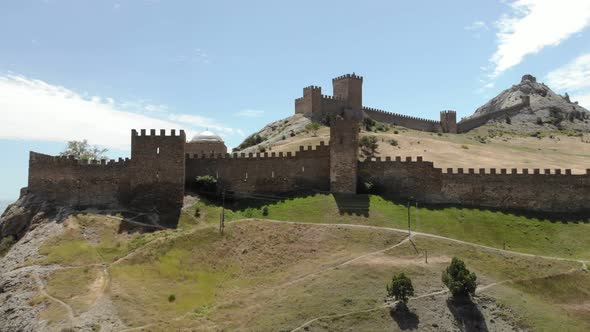 Aerial Around Stone Towers Wall Genoese Fortress Citadel on Mountain in Bay of Black Sea Sudak