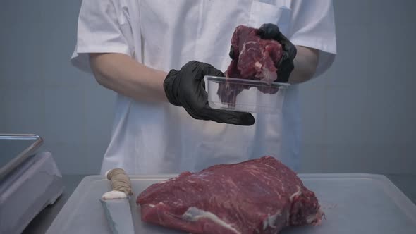 People Prepare Fresh Meat for Delivery to Stores