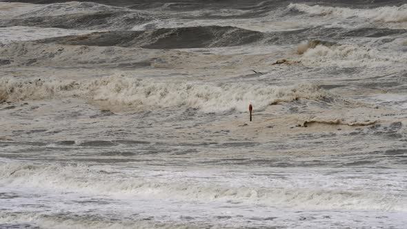 Big winds, huge waves crash the coast of Den Haag, the Netherlands.