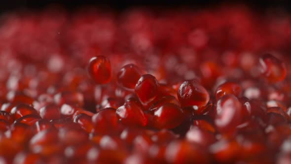 Pomegranate seeds. Slow Motion.