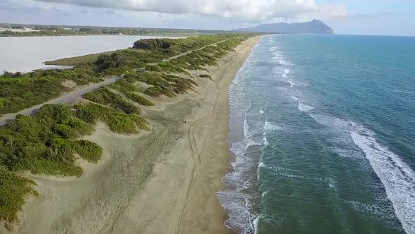 Road Is for Cars Located Along the Coast Leading To the Mountains, Aerial Survey, Slow Motion