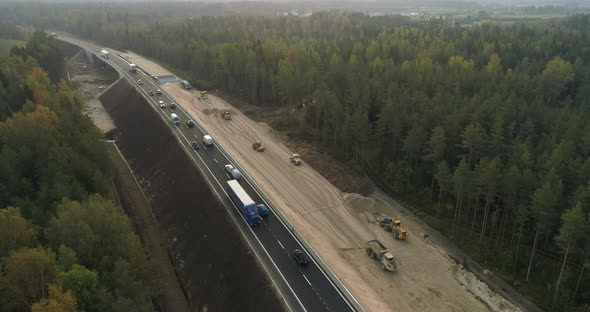 Highway Road Construction Aerial View Drone Shot at Sunrise