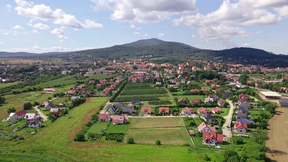 Aerial View of Village Near Mountains