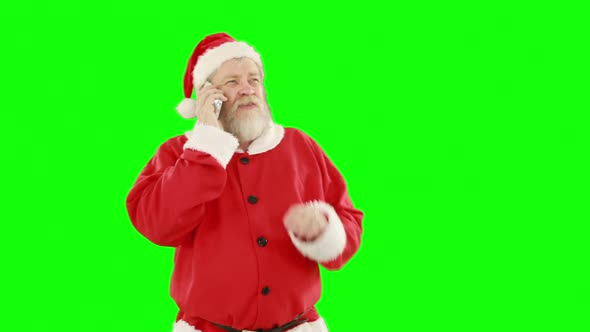 Santa claus talking on mobile phone