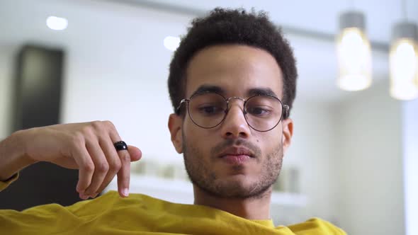 Portrait of an AfricanAmerican Student with Glasses