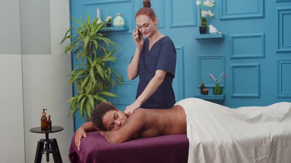 Woman Resenting By Bad Customer Service While Having Massage Indoors