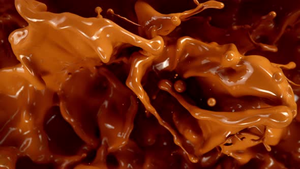 Super Slow Motion Shot of Splashing Melted Caramel at 1000 Fps