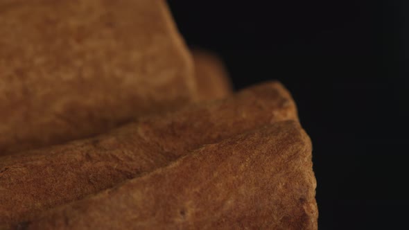 Cinnamon sticks on a dark background