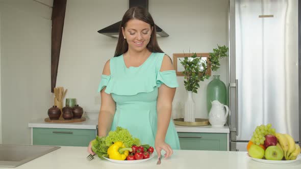 Young Charming Woman Tasting Healthy Food Expressing Enjoyment at Home