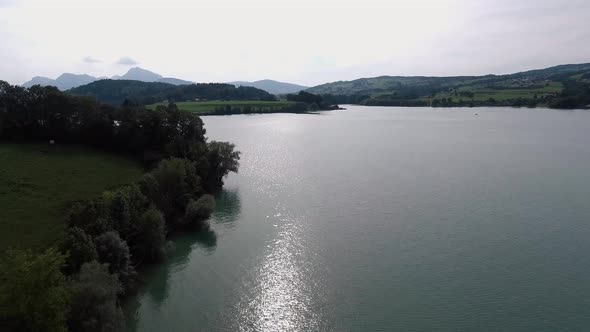 Flight Next To The Coast Above Nature, Lake Gruyère, Switzerland