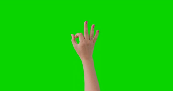 Isolated Woman Hand Pink Manicure Showing The A-Ok, Ok or Good Sign Symbol. Green Screen Compositing