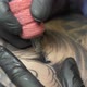 Tattoo Artist Applies Colour Person Back Needles - VideoHive Item for Sale