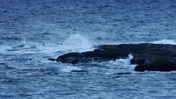 Ocean Waves Breaking On Rocks