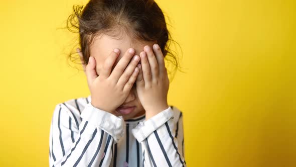 a Upset Child Girl Looking Down