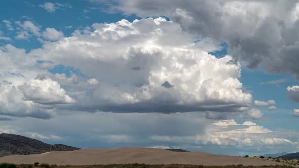 Timelapse of clouds building over the sand dunes at Little Sahara