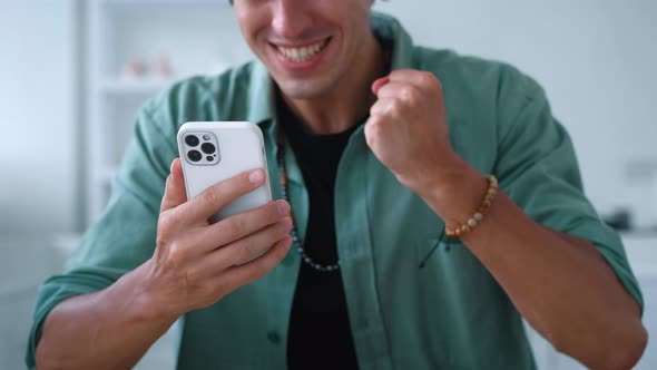 Closeup Excited Man Looking at Smartphone Celebrate Success Mobile Win Online Bet