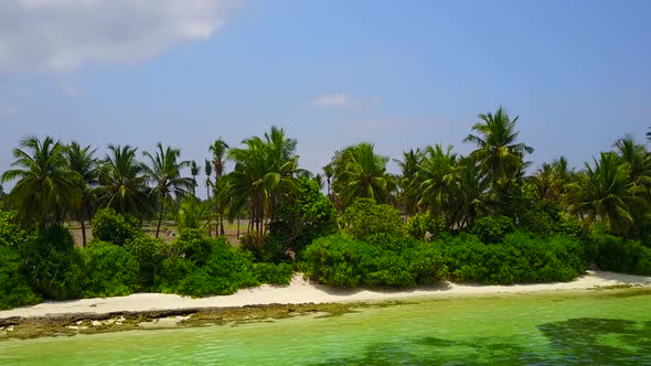 Aerial drone travel of resort beach by blue ocean with sand background