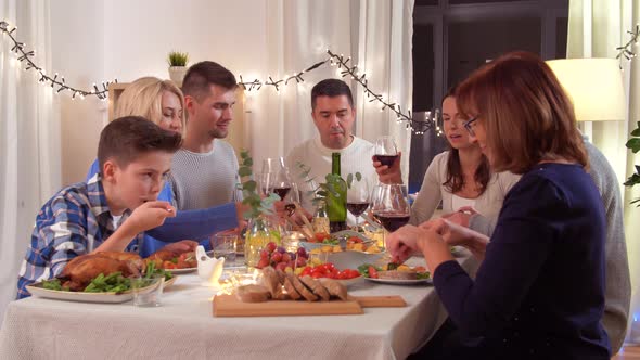 Happy Family Having Dinner Party at Home