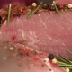 Close Up of Knife Cuts Piece of Fresh Pork Sprinkled with Peppercorns Spices Seasonings - VideoHive Item for Sale