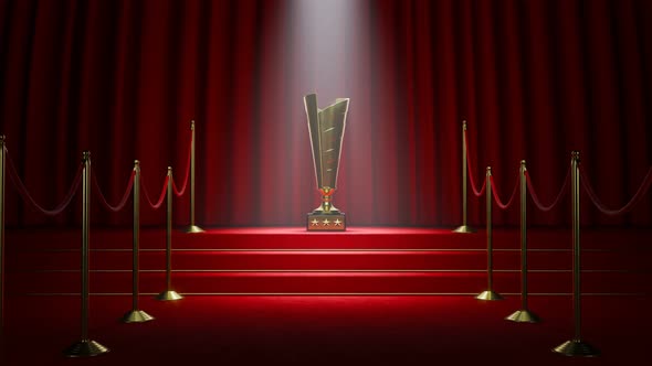 Golden movie award standing in a spotlight on the red carpet stairs. 4KHD