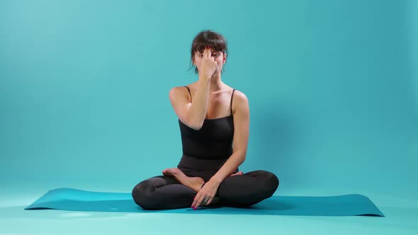 Young Adult Doing Recreation Activity with Yoga Pose on Floor Mat