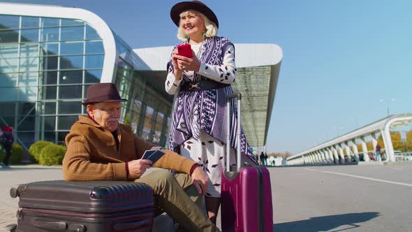 Senior Pensioner Tourists Grandmother Grandfather Waiting Boarding Near International Airport Hall