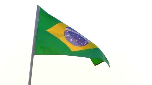 Brazil flag waving over white background.