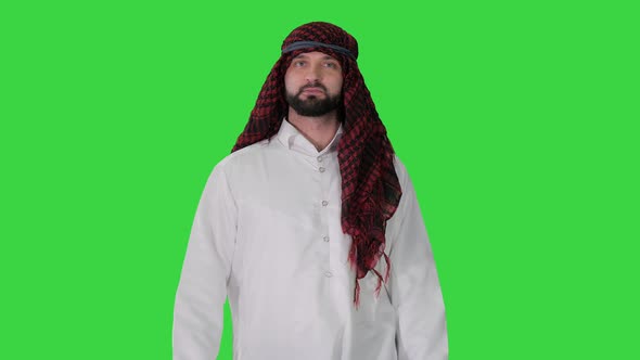 Handsome Sheikh Walking and Looking To Sides on a Green Screen, Chroma Key.